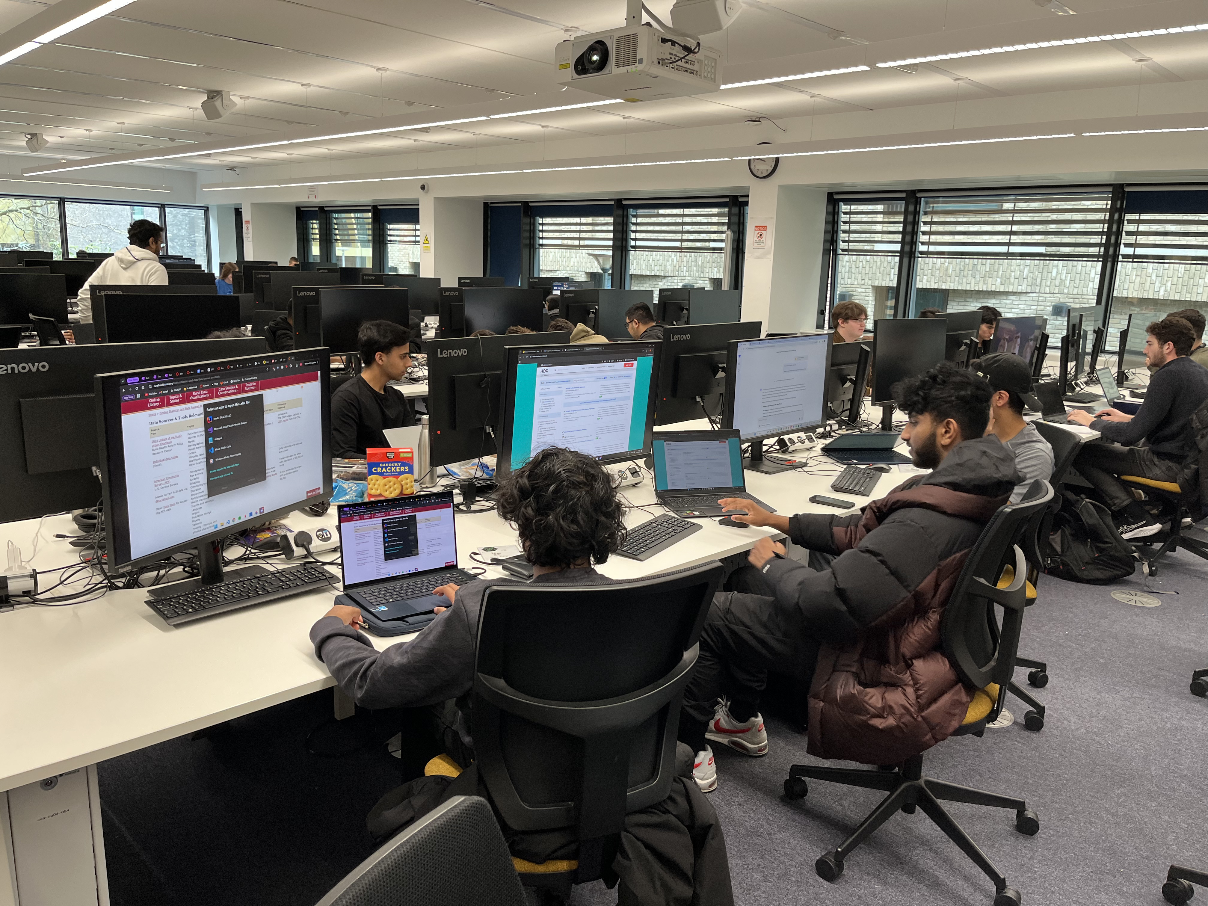 A photo of UG04 and attendees working on their projects.